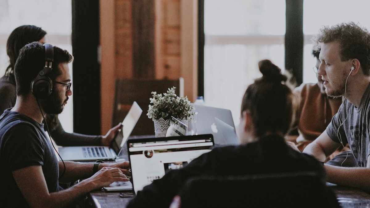 Team collaborating on documents — professional document sharing between Android and iPhone